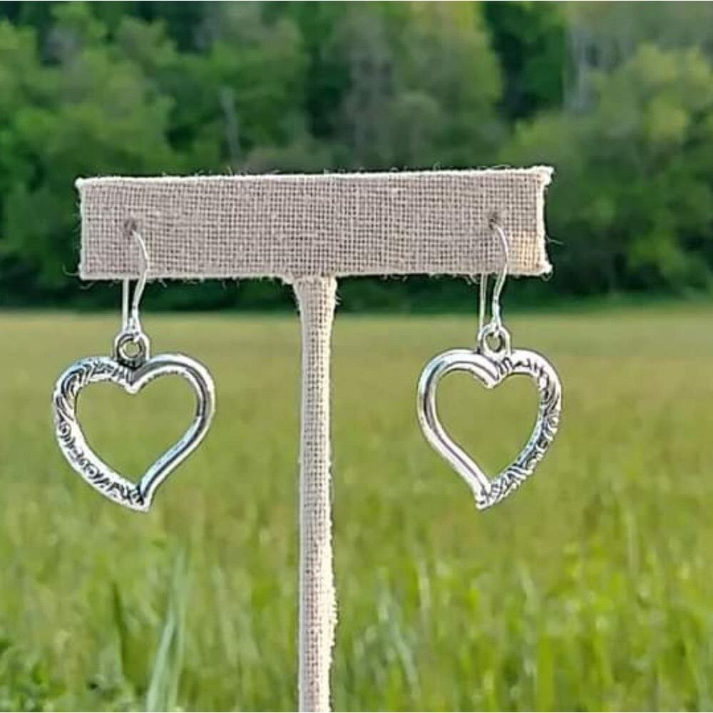 Heart charm earrings on sterling silver earwires